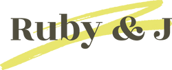 Ruby & J Logo in black writing on a yellow swirl